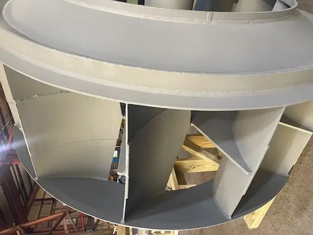 Industrial fan component with visible internal structure.