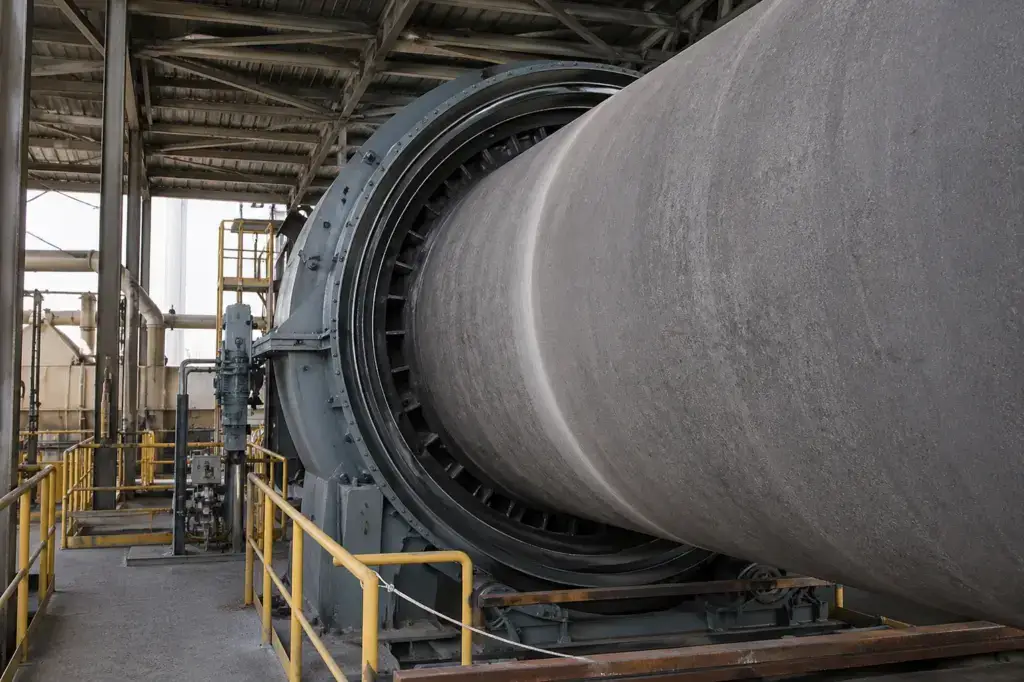Large industrial rotary drum in a processing facility.