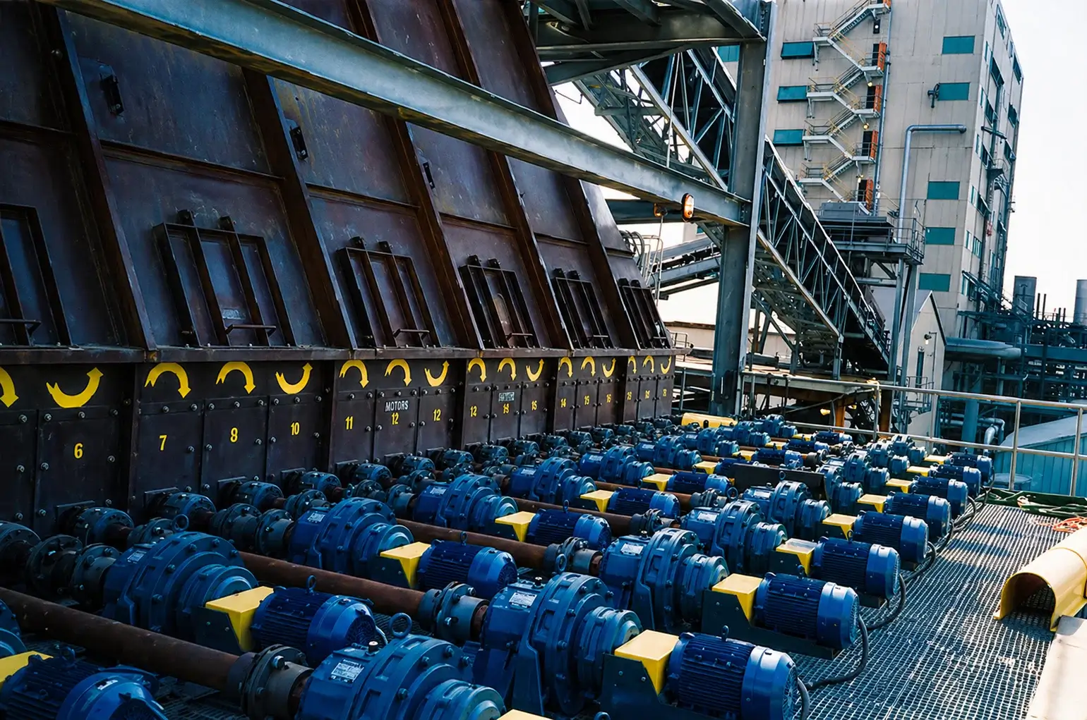 Industrial fans and motors in a processing facility.