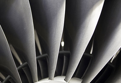 Close-up of industrial fan blades in motion.