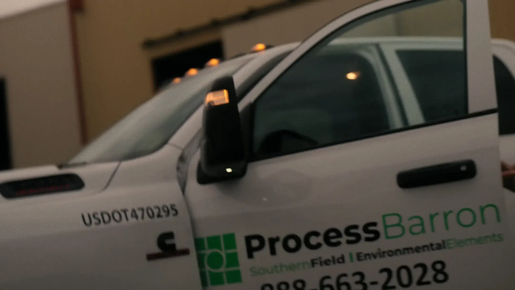 Truck door opening, Process Barron logo visible.