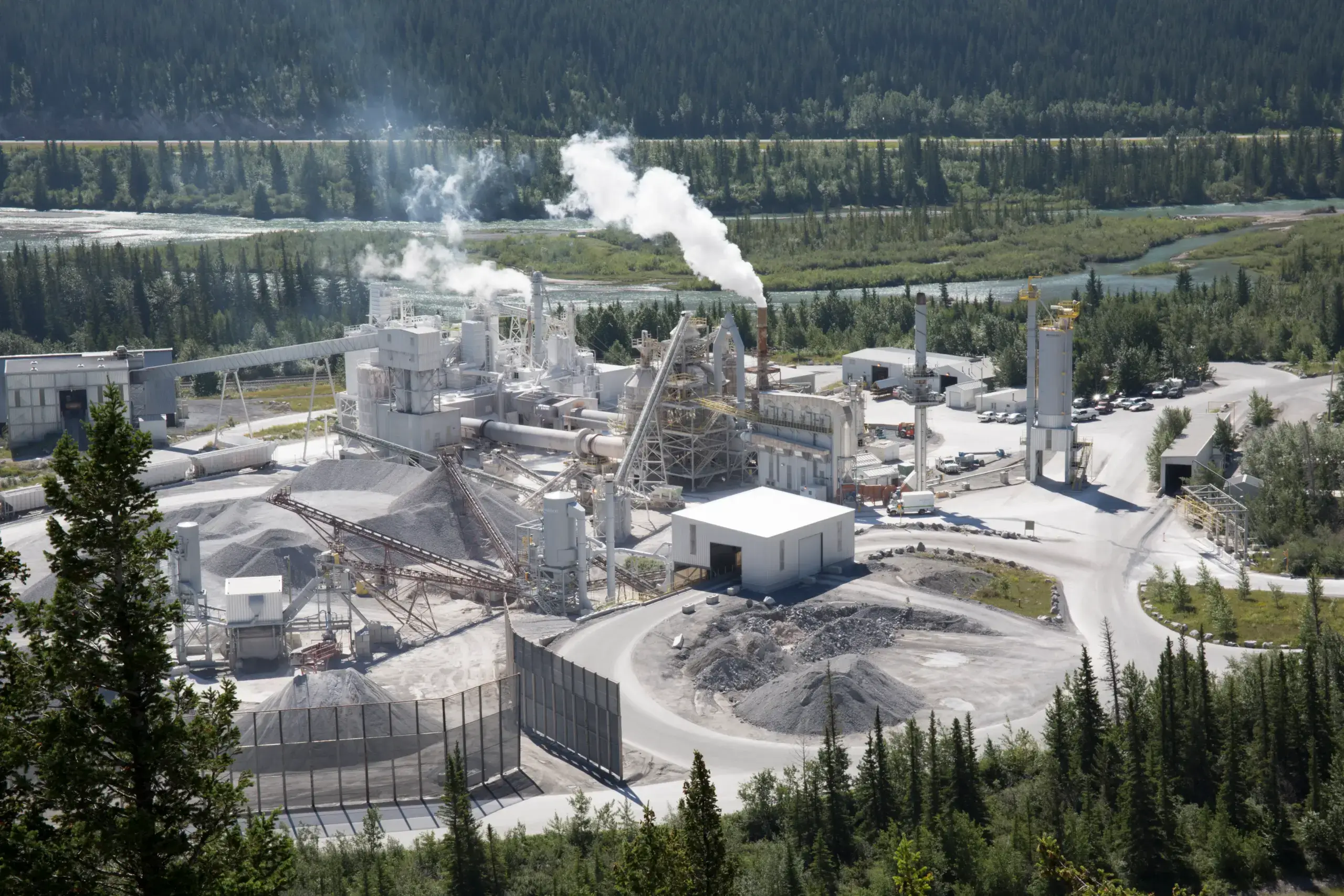 cement_plant_in_valley_and_forest