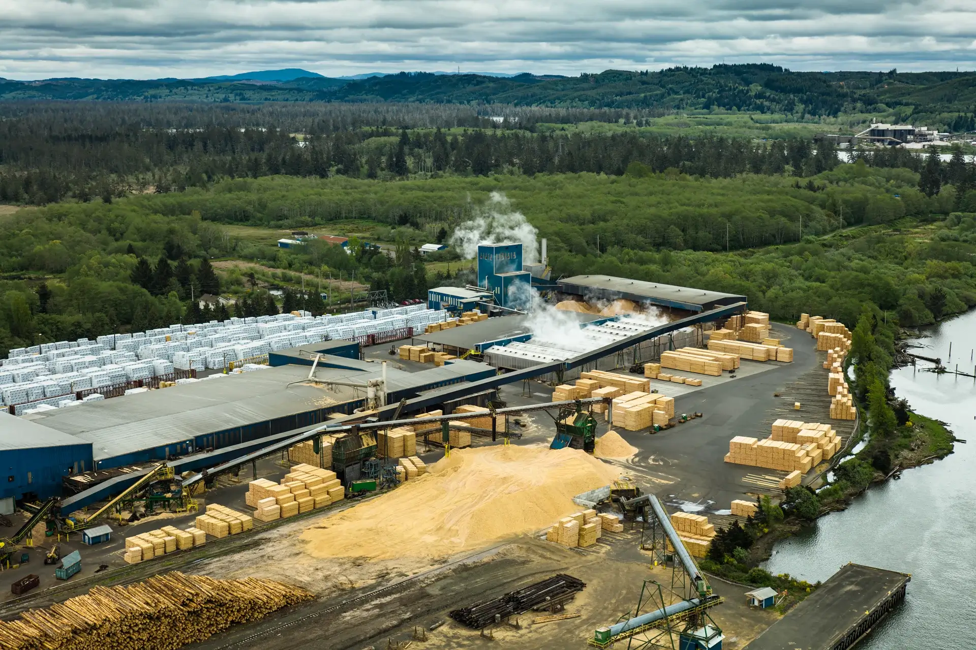 Aerial-View-of-Large-Sawmill-on-Overcast-Day