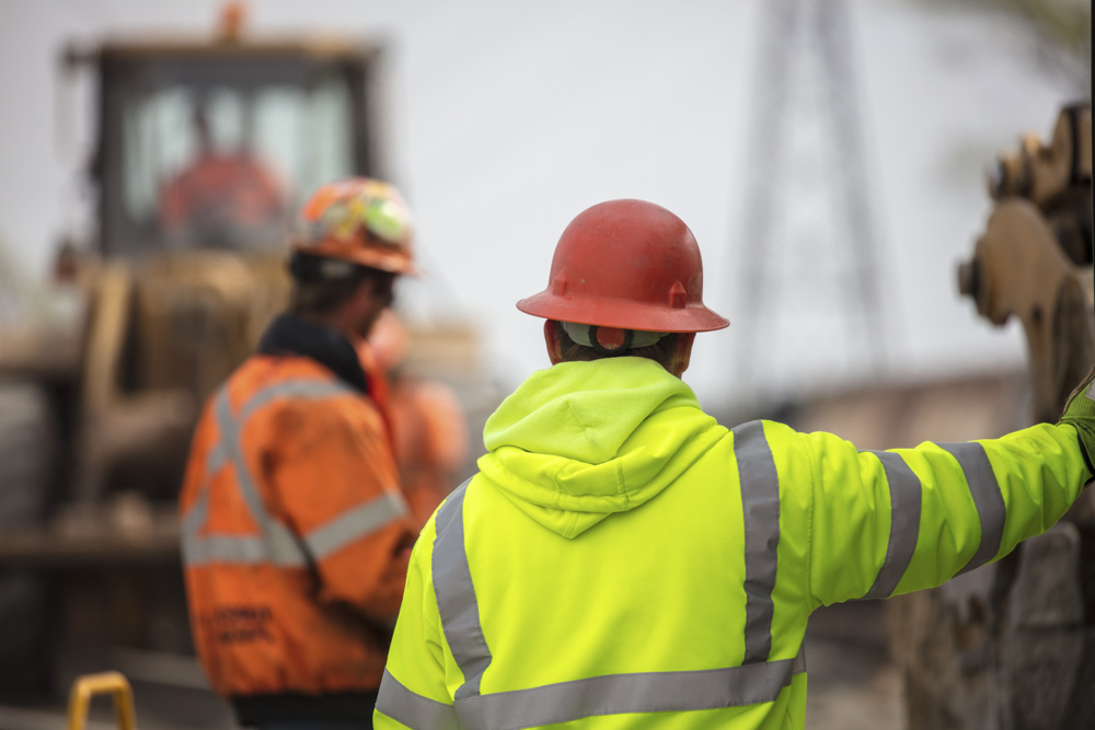 construction supervisor reviewing construction work