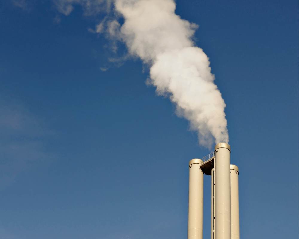 industrial stack with smoke coming out